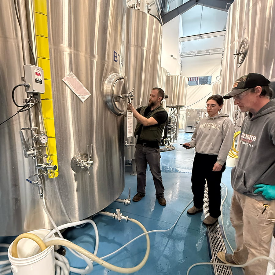 True North Brewing Company students working in the brew vats