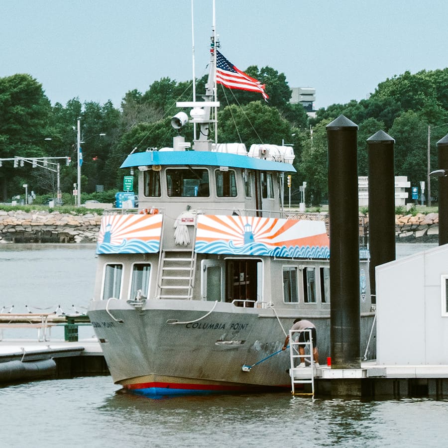 Harbor cruise boat, the Columbia Point, at the dock at UMass Boston.