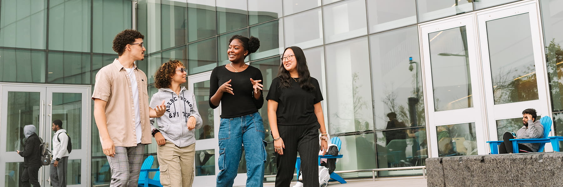 Business students walk in front of University Hall.